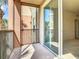 Screened balcony with sliding glass doors at 8298 Portofino Dr # 202, Davenport, FL 33896