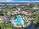 Aerial view of community with pool and surrounding buildings at 8298 Portofino Dr # 202, Davenport, FL 33896