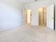 Spacious bedroom with a large closet and en-suite bathroom at 8298 Portofino Dr # 202, Davenport, FL 33896