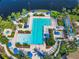 Aerial view of resort-style pool with multiple lounging areas at 8298 Portofino Dr # 202, Davenport, FL 33896