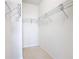 Spacious walk-in closet with wire shelving at 8298 Portofino Dr # 202, Davenport, FL 33896