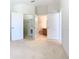 Spacious bedroom with ample closet space and access to a bathroom at 8298 Portofino Dr # 202, Davenport, FL 33896
