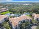 Condo building and lake view from above at 8298 Portofino Dr # 202, Davenport, FL 33896