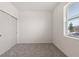 Spacious bedroom with gray carpeting and double door closet at 188 Bottle Brush, Haines City, FL 33844