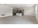 Modern kitchen with gray cabinets and island at 188 Bottle Brush, Haines City, FL 33844