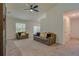 Spacious living room with a modern fireplace and comfortable seating at 319 St Cloud Rd, Poinciana, FL 34759