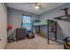 bedroom with a loft bed, dresser, and playful decor at 319 St Cloud Rd, Poinciana, FL 34759