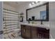 Bathroom with a double vanity and shower/tub combo at 319 St Cloud Rd, Poinciana, FL 34759