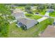 Aerial view of a single story house with a spacious backyard and shed at 319 St Cloud Rd, Poinciana, FL 34759