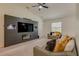 Living room with built-in entertainment center and fireplace at 319 St Cloud Rd, Poinciana, FL 34759