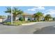 Community building with attractive exterior and landscaping at 8362 Bella Tierra Ct, Davenport, FL 33896