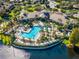 Aerial view of community pool and clubhouse at 8362 Bella Tierra Ct, Davenport, FL 33896