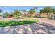 Attractive community entrance with fountain and landscaping at 8362 Bella Tierra Ct, Davenport, FL 33896