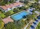 Community tennis court with ample parking nearby at 8362 Bella Tierra Ct, Davenport, FL 33896