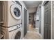 Stackable washer and dryer in a convenient laundry room at 8815 Worldquest Blvd # 103 In Building 3, Orlando, FL 32821