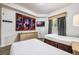 Two twin beds, a TV and dresser, perfect for guests at 8815 Worldquest Blvd # 103 In Building 3, Orlando, FL 32821