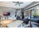 Relaxing living room with comfortable seating and balcony access at 8815 Worldquest Blvd # 103 In Building 3, Orlando, FL 32821