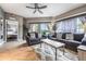 Comfortable living room with grey sofas, access to patio and bedroom view at 8815 Worldquest Blvd # 103 In Building 3, Orlando, FL 32821