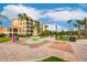 Beautiful community fountain with a surrounding patio and landscaping at 8815 Worldquest Blvd # 103 In Building 3, Orlando, FL 32821