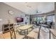 Bright dining area with glass table and seating for four at 8815 Worldquest Blvd # 103 In Building 3, Orlando, FL 32821