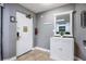 Inviting entryway with storage and a mirror at 8815 Worldquest Blvd # 103 In Building 3, Orlando, FL 32821