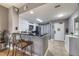 Modern kitchen featuring granite countertops and stainless steel appliances at 8815 Worldquest Blvd # 103 In Building 3, Orlando, FL 32821