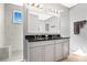 Spa-like bathroom with double vanity and large shower at 593 Lake Wildmere Cv, Longwood, FL 32750