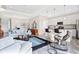 Open concept living area with kitchen and island at 593 Lake Wildmere Cv, Longwood, FL 32750