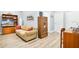 Cozy living room featuring a comfortable sofa and built-in shelving at 593 Lake Wildmere Cv, Longwood, FL 32750