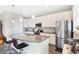 Modern kitchen with stainless steel appliances and an island at 593 Lake Wildmere Cv, Longwood, FL 32750