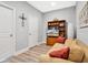 Bright living room with a sofa and flat-screen TV at 593 Lake Wildmere Cv, Longwood, FL 32750