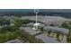 Aerial view of a townhome community by the lake at 593 Lake Wildmere Cv, Longwood, FL 32750