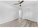 Well-lit bedroom featuring vinyl flooring and a closet at 920 S Solandra Dr, Orlando, FL 32807