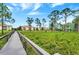 Scenic walkway with views of the community and nature at 10323 Kensington Shore Dr # 201, Orlando, FL 32827