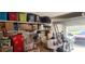 Organized garage with shelves, workbench, and ample storage space at 402 Quarry Rock Cir, Kissimmee, FL 34758