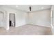 Simple bedroom with tiled floor and ensuite bathroom at 594 Piazza Pt, Oviedo, FL 32765
