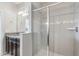 Bathroom with a large walk-in shower and grey tile at 594 Piazza Pt, Oviedo, FL 32765