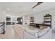 Open concept living room with kitchen access at 594 Piazza Pt, Oviedo, FL 32765