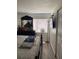 Bright bedroom with large bed and window at 4743 S Texas Ave # 4743B, Orlando, FL 32839