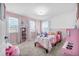 Charming bedroom with unicorn decor and full bed at 1008 Overlook Ct, Davenport, FL 33837