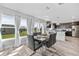 Bright dining area with seating for six and view of the backyard at 1008 Overlook Ct, Davenport, FL 33837