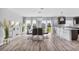 Modern dining room with table for six and backyard access at 1008 Overlook Ct, Davenport, FL 33837