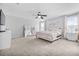 Spacious Primary bedroom with king-size bed and large mirrors at 1008 Overlook Ct, Davenport, FL 33837