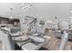 Elegant dining area connecting to kitchen and living room at 1008 Overlook Ct, Davenport, FL 33837