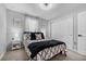 Guest bedroom with double bed, nightstand and closet at 1008 Overlook Ct, Davenport, FL 33837