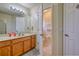 Guest bathroom with single vanity and toilet at 221 Las Fuentes Dr, Kissimmee, FL 34746