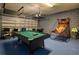 Fun game room with pool table, basketball game, and foosball table at 221 Las Fuentes Dr, Kissimmee, FL 34746