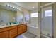Large bathroom with double vanity, tub, and shower at 221 Las Fuentes Dr, Kissimmee, FL 34746