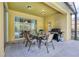 Outdoor patio with seating, grill, and pool view at 221 Las Fuentes Dr, Kissimmee, FL 34746