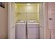 Convenient laundry closet with washer and dryer at 221 Las Fuentes Dr, Kissimmee, FL 34746